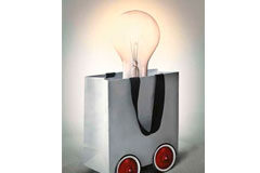 Los tópicos del sector Una bombilla dentro de una bolsa con ruedas