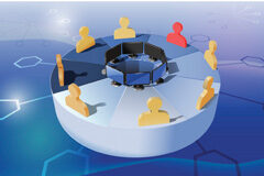 ‘Workspaces’: colaboración y conocimiento Siluetas de colores mirando ordenadores alrededor de una mesa