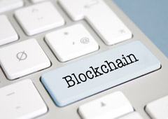 Teclado de ordenador con la palabra Blockchain