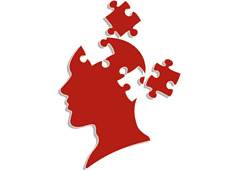 Una cabeza de color rojo con piezas de puzzle