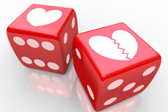 Divorcio ante notario tras la nueva Ley de Jurisdicción Voluntaria Dados con un dibujo de un corazón y otro con un corazón roto