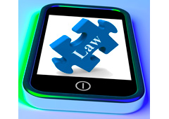Smartphone con imagen de una pieza de puzzle con la palabra Law