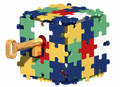 Una caja hecha de piezas de puzzle con una llave