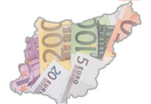 El Impuesto sobre la Riqueza y las Grandes Fortunas en Guipúzcoa y la desarmonización fiscal entre los Territorios Vascos Mapa de guipúzcoa con dinero de fondo