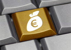 Un teclado con un símbolo del euro dentro de un saquito