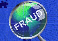 Una lupa aumentando la palabra fraud