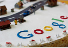 Una maqueta de una carretera y las letras google en plastilina de colores