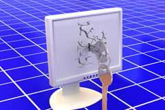 La protección de la propiedad Industrial e Intelectual en Internet Una pantalla de ordenador con una llave incrustada.