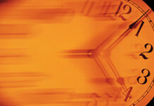 Horas sindicales y vacaciones Reloj de fondo naranja