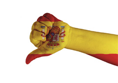Mano con la bandera española indicando hacia abajo