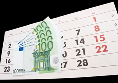 Un calendario y billetes de euro