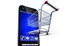 Estas Navidades ¿nos atreveremos a utilizar el mCommerce? Carrito de la compra saliendo de un smartphone