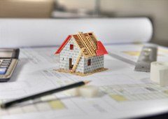 Una casita sobre unos planos Una casita sobre unos planos