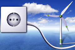 Cambio en la regulación energética en territorios no peninsulares Un enchufe y un molino eólico