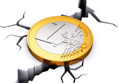 Moneda de un euro sobre una grieta