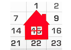 Una casita roja sobre un calendario