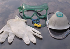 Unos guantes, una mascarilla y unas gafas de trabajador Unos guantes, una mascarilla y unas gafas de trabajador