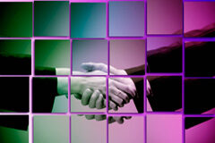 ¿Puede un socio impugnar un acuerdo adoptado en una junta en la que no era socio todavía? Dos personas dándose la mano