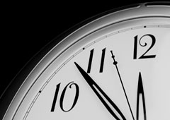 Un cuarto de la esfera de un reloj. Un cuarto de la esfera de un reloj.