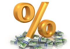 Símbolo del tanto por ciento sobre fajos de billetes de euros Símbolo del tanto por ciento sobre fajos de billetes de euros