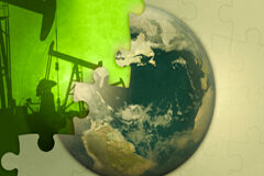 Análisis de los nuevos recortes a las empresas de energías renovables Puzzle de una bola del mundo
