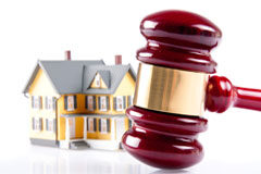 Cuotas imputables al adjudicatario en subasta Una casita y una maza.